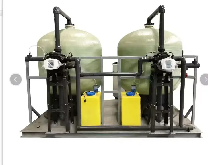 The water softener softens hard water through ion exchange.